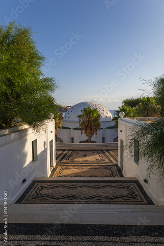 Kalithea, Greece, September 29, 2023 - Seaside landscape. Kalithea Therme Observator spa. Beautiful buildings built in the 1930s, Kallithea bay photo