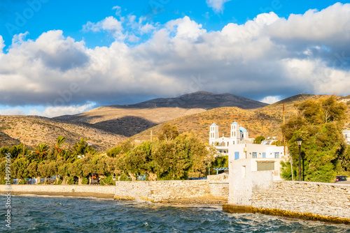 Obraz na płótnie View of church building on sea coast in Katapola port at sunset time, Amorgos island, Cyclades, Greece w salonie