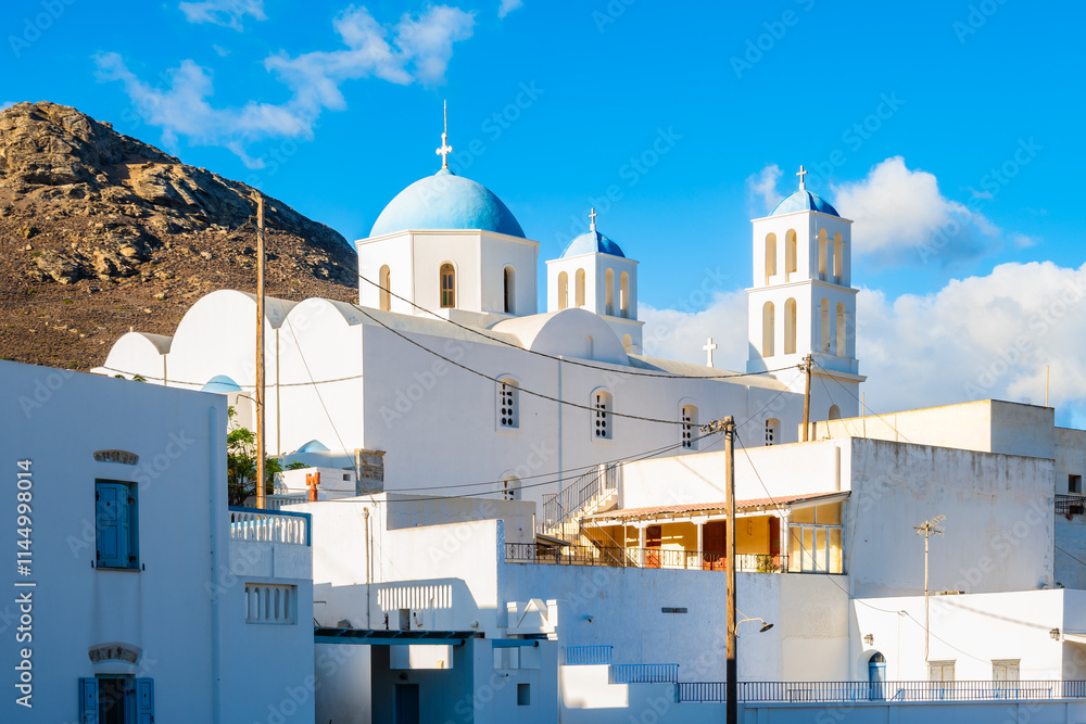 View of church building and typical Greek houses in Katapola village, Amorgos island, Cyclades, Greece