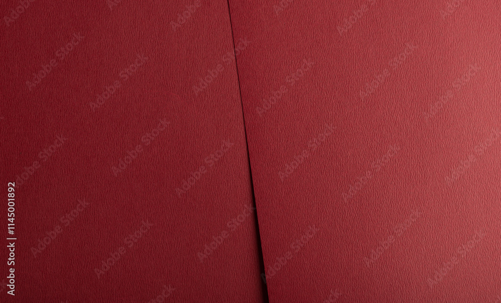 Fototapeta premium Rich red paper texture in chili pepper tones with a woven matte finish. Featuring a luxurious and bold design, this vibrant and sophisticated material is perfect for decorative