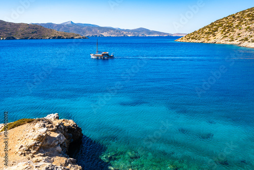 Obraz na płótnie Fishing boat on azure blue sea near Maltezi bay, Amorgos island, Cyclades, Greece w salonie