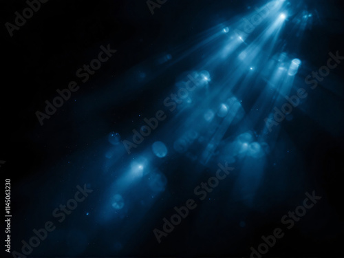 Glowing blue nebula with celestial light beams, evoking a mystical and ethereal cosmic scene.