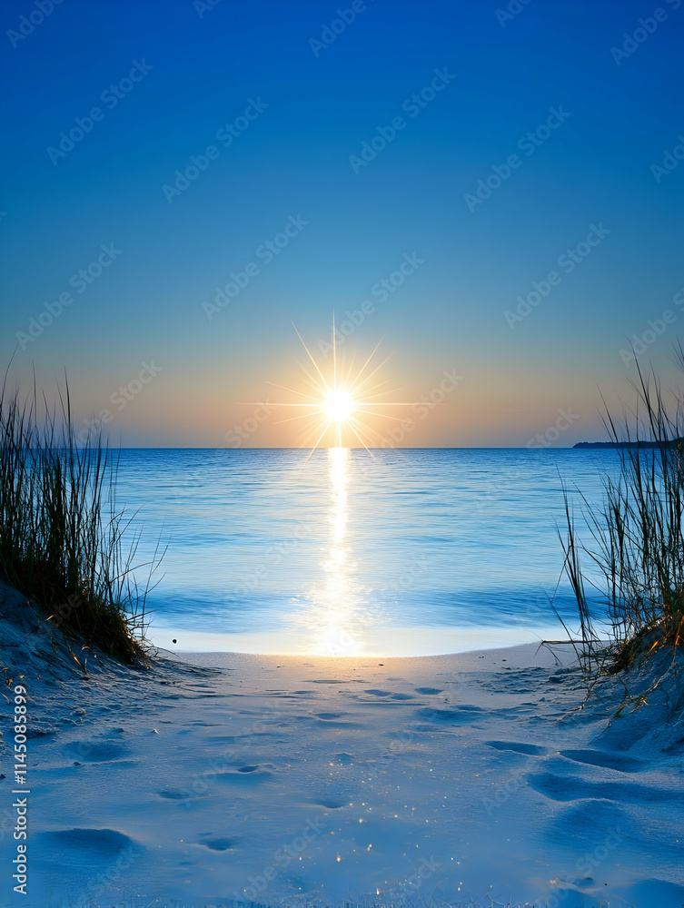 Sunrise Creates Starburst Reflection on Calm Water with Beach Grass and Summer Vacation Vibes. Sunrise Creates Starburst Reflection on Calm Water with Beach Grass and Summer Vacation Vibes.