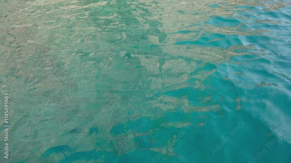 Beautiful reflection sunlight with shining turquoise water rippled waves, calm natural crystal clean fresh water, effect scene with sparkles water, slow motion, close up, 4k footage Beautiful reflection sunlight with shining turquoise water rippled waves, calm natural crystal clean fresh water, effect scene with sparkles water, slow motion, close up, 4k footage