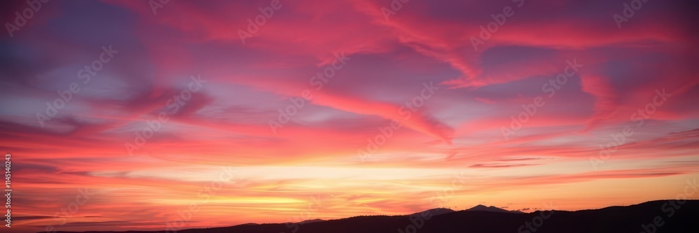 Fototapeta premium Vibrant orange and pink hues paint the abstract sky at sunset, creating a mesmerizing display of colors, serene, breathtaking