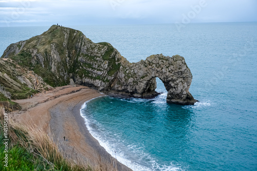 Foto Durdle Door limestone arch on the Jurassic Coast in Dorset