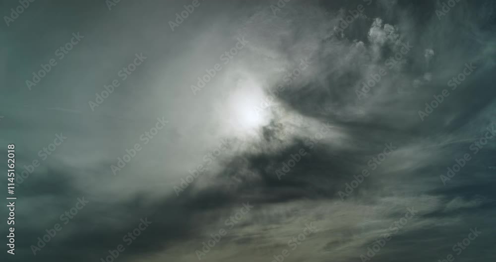Timelapse of the beautiful view of the sky with different types of clouds calmly flowing trying to hide the sun which still shines through the white and creates interesting shapes and shadows Timelapse of the beautiful view of the sky with different types of clouds calmly flowing trying to hide the sun which still shines through the white and creates interesting shapes and shadows