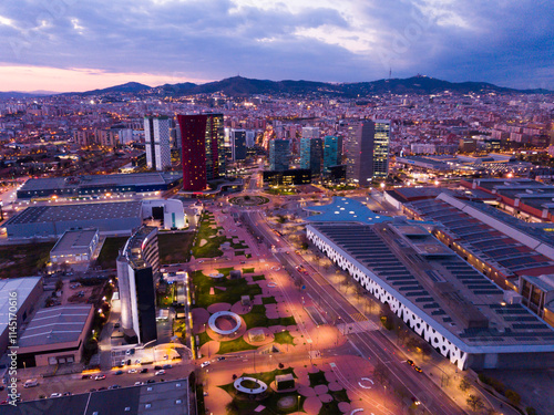Foto Aerial view of illuminated Plaza de Europa with modern conference center Fira Ba