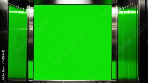 Modern elevator doors opening revealing a green screen, perfect for keying or compositing