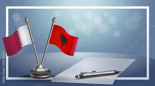 Qatar and Albania National flags on small table with bokeh background, cooperative relationship.....