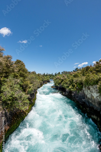 Huka Falls: Powerful Waterfall on Waikato River, Taupo, New Zealand – Turquoise Cascades, Dramatic Rapids, and Rugged Terrain photo