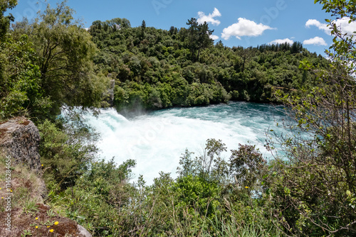 Huka Falls: Powerful Waterfall on Waikato River, Taupo, New Zealand – Turquoise Cascades, Dramatic Rapids, and Rugged Terrain photo