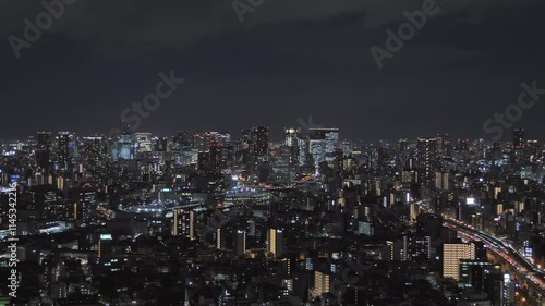osaka city skyline  establishing aerial shot at night,view of umeda downtown ward from distance
