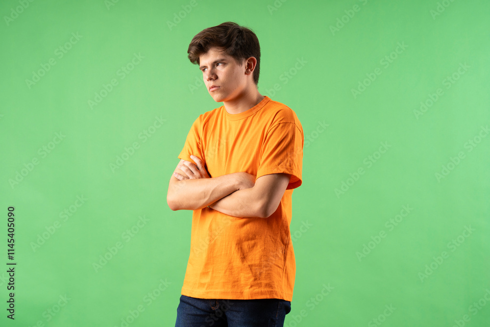 Young person expressing various emotions and body pains, pointing, using a cellphone, with colored backgrounds and wearing shirts of different colors Young person expressing various emotions and body pains, pointing, using a cellphone, with colored backgrounds and wearing shirts of different colors