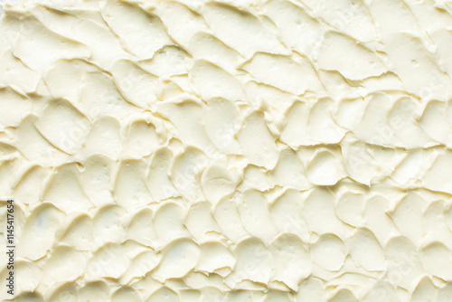 silky smooth american buttercream on a marble surface,Top view of buttercream for decorating cake, overhead view of smooth buttercream photo