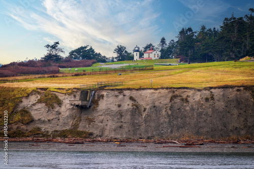 Admiralty Head Lighthouse located in Fort Casey State Park on Whidbey Island, in Island County, Washington. A 30-foot tall brick and stucco building designed by Carl Leick and completed in 1903.  