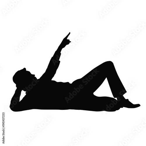 Silhouette of a man lying down while pointing upwards