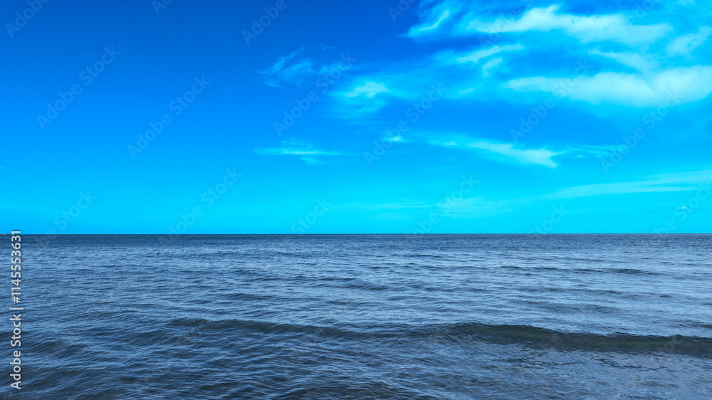 Nature of the beach and sea Summer with sunshine, sandy beaches, clear blue waters sparkling against the blue sky. On an island with good ecology and environment Background for summer vacation concept Nature of the beach and sea Summer with sunshine, sandy beaches, clear blue waters sparkling against the blue sky. On an island with good ecology and environment Background for summer vacation concept