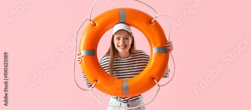 Happy female beach rescuer ...