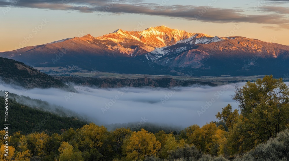 Stunning Snow-Capped Mountain Range Under Golden Sunrise Sky Stunning Snow-Capped Mountain Range Under Golden Sunrise Sky
