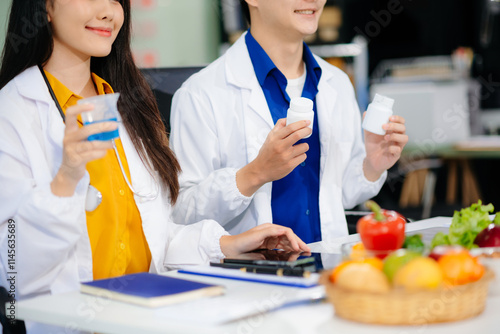 Doctors sharing fresh vegetables, promoting health and nutrition. Ideal for wellness, healthcare, and science themes. photo