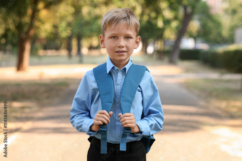 Cute little boy with backpack outdoors Cute little boy with backpack outdoors