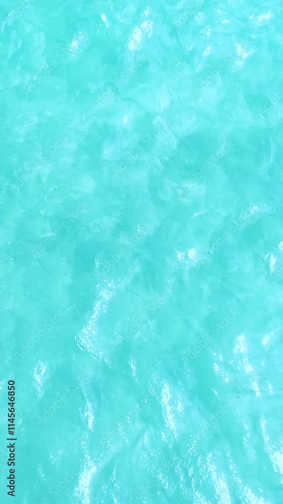 Turquoise Water Texture: A captivating abstract of turquoise water, shimmering with light and reflecting the azure sky. Tranquil and serene, this texture evokes a sense of peace and tranquility. Turquoise Water Texture: A captivating abstract of turquoise water, shimmering with light and reflecting the azure sky. Tranquil and serene, this texture evokes a sense of peace and tranquility.