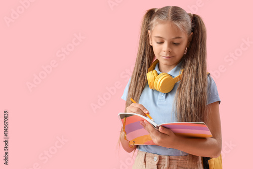 Cute little girl writing so...