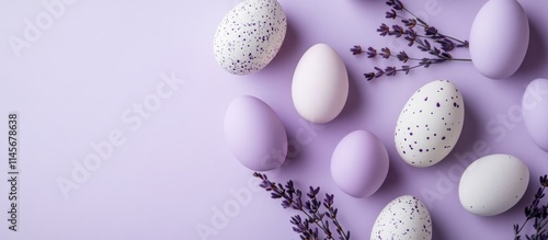 Easter egg arrangement in lilac hues with decorative lavender sprigs on a pastel backdrop evoking festive charm and spring aesthetics photo