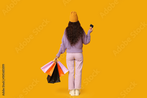 Young Asian woman with shop...