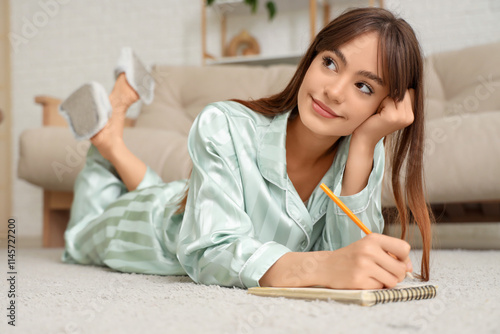 Thoughtful young woman in p...
