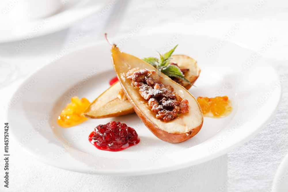 baked pear on the Christmas table baked pear on the Christmas table
