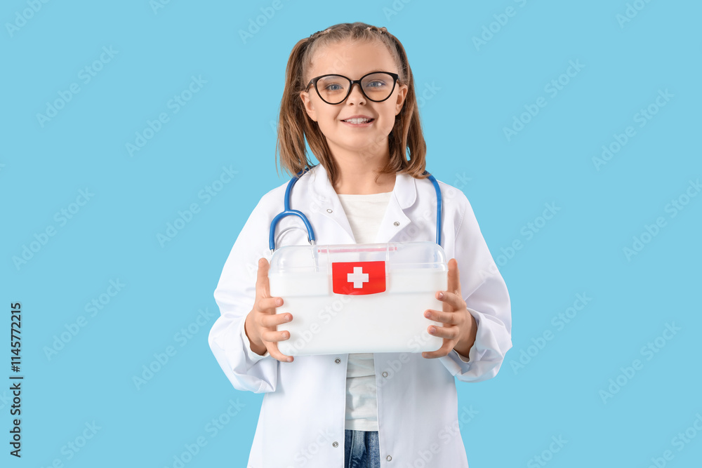 Cute doctor with first aid kit on blue background Cute doctor with first aid kit on blue background