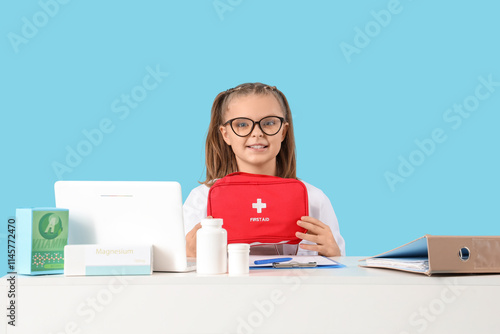 Cute doctor with first aid ...