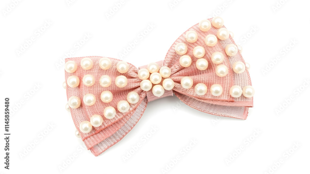 A hair clip featuring a large bow adorned with pearls, isolated on white A hair clip featuring a large bow adorned with pearls, isolated on white