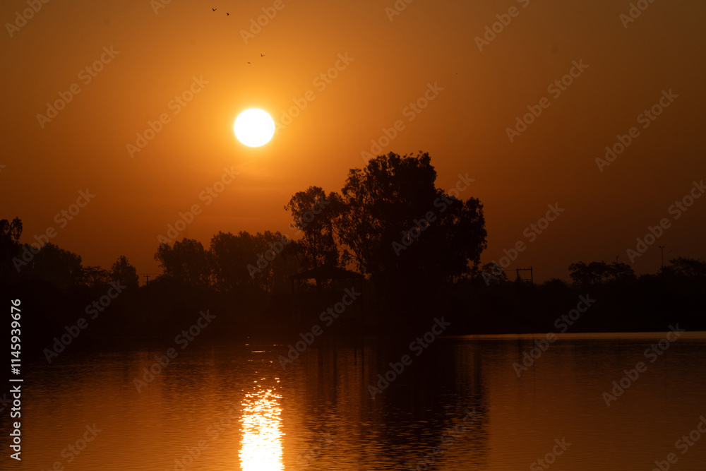 sunset over the river sunset over the river