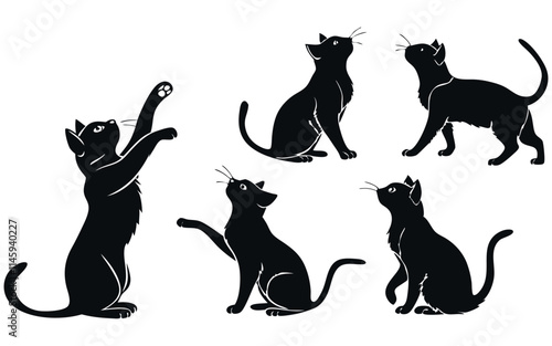 A collection of five black cat icon set silhouettes in different playful and attentive poses. Perfect for use in pet-related graphics, illustrating the dynamic and curious nature of cats