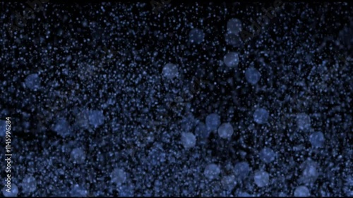 snowflakes and drops falling on the window