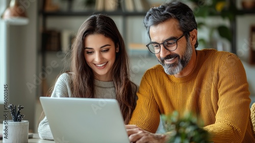 Indian businessman showing some detail in laptop to his lady assistance --ar 16:9 --quality 2 --stylize 750 --v 6.1 Job ID: d66e66bc-8bec-414a-83f6-ef0b1e2657cc