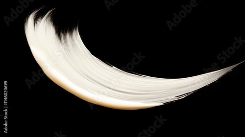 White lotion brush on black background