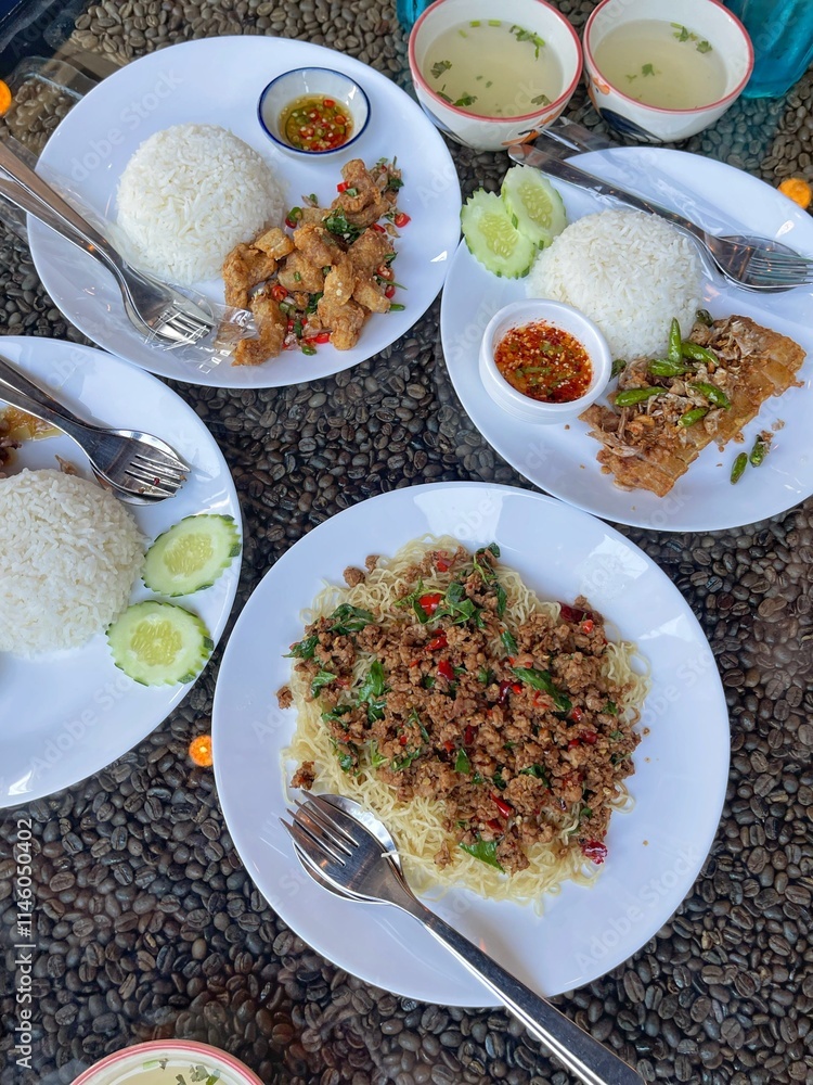 Rice topped with stir-fried pork and basil, Rice topped with stir fried minced pork and basil with Fried egg Rice topped with stir-fried pork and basil, Rice topped with stir fried minced pork and basil with Fried egg