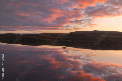 Quiraing mountains Reflections  at a lake in Skye Island, Scotland