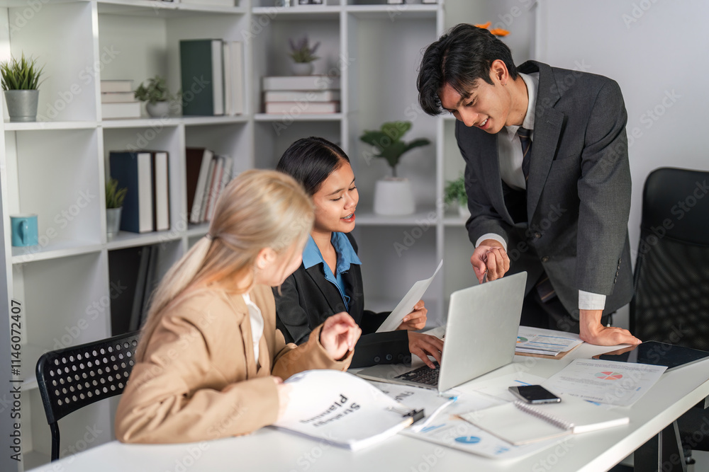 Diverse Business Team Collaborating on Project Strategy in Modern Office Environment Diverse Business Team Collaborating on Project Strategy in Modern Office Environment