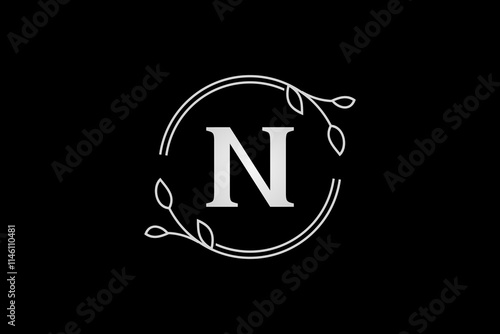 letter n with circle branches and leaves frame elegant luxury logo