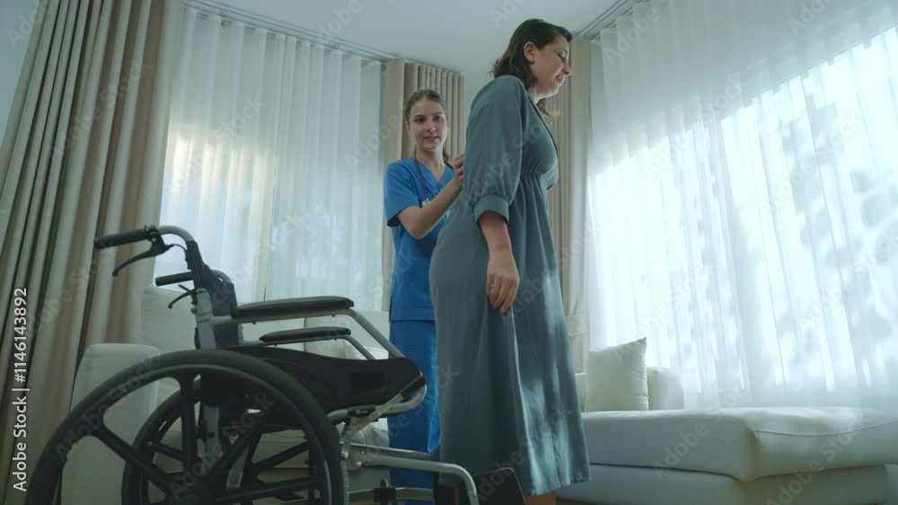 Compassionate Caregiver Supports Patient in Wheelchair, Enhancing Healthcare Interaction in Bright, Modern Room Filled with Comfort and Care. Compassionate Caregiver Supports Patient in Wheelchair, Enhancing Healthcare Interaction in Bright, Modern Room Filled with Comfort and Care.