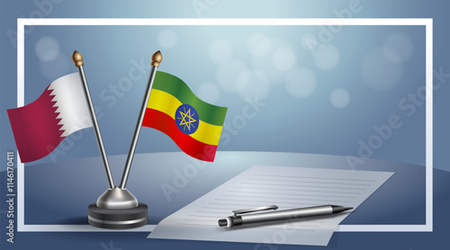 Qatar and Ethiopia National flags on small table with bokeh background, cooperative relationship