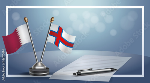 Qatar and Faroe Islands National flags on small table with bokeh background, cooperative relationship