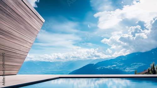 Infinity pool in front of a modern wooden villa amidst an alpine landscape