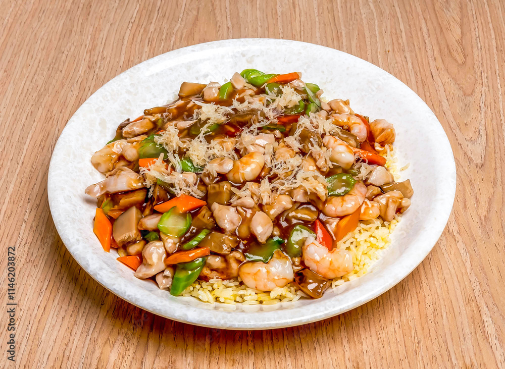 Hokkien Fried Rice served in plate dish isolated on wooden table side view of hong kong food
