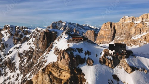 Aerial view of the Rifugio Lagazuoi and Cable Car Lagazuoi on the edge of the cliff. Dolomites, Italy